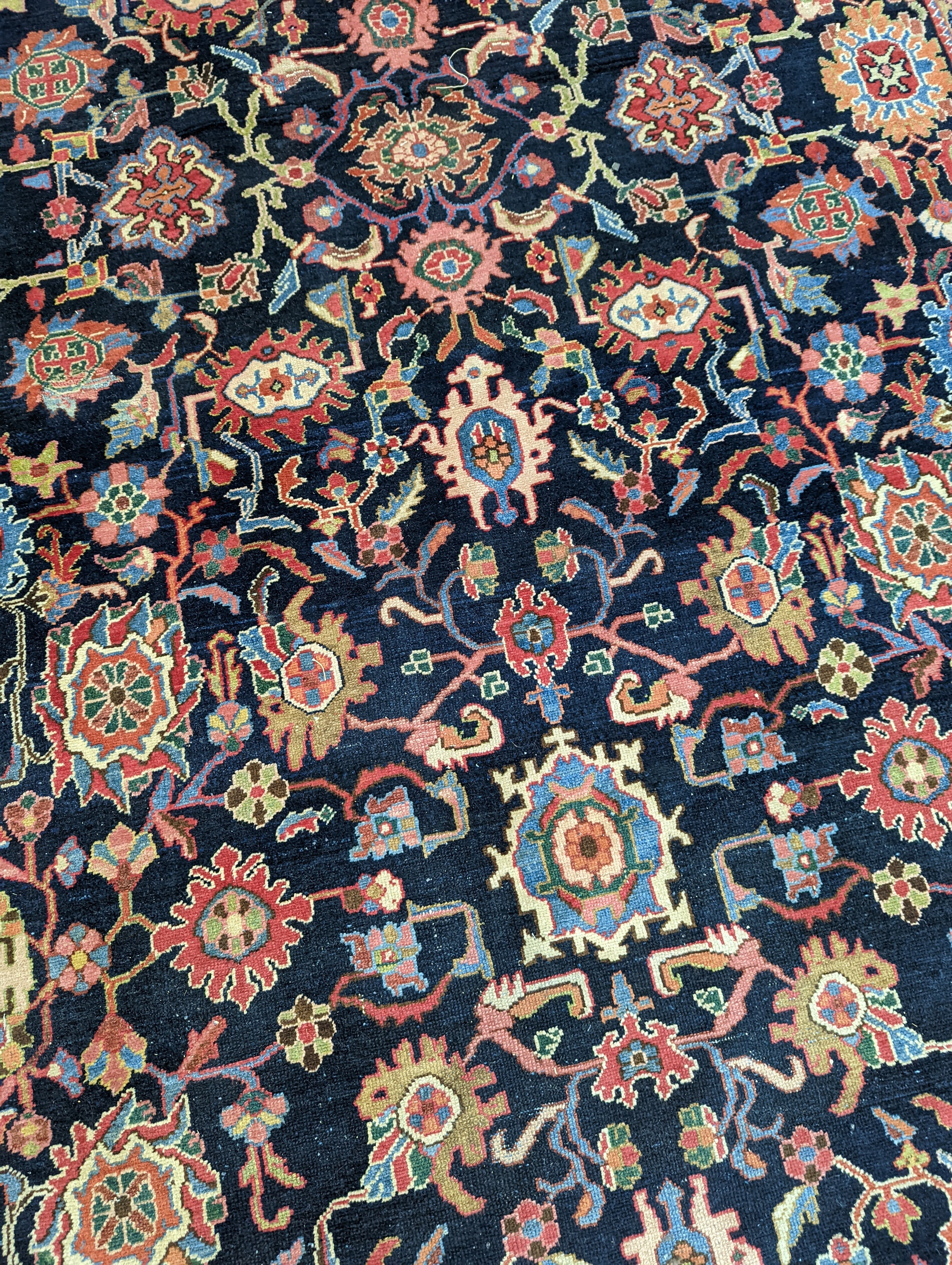 A Heriz / Moghal blue ground carpet, 340 x 206cm